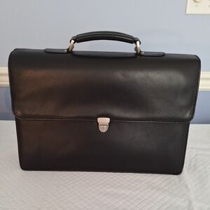 Wilson leather black atache brief case.